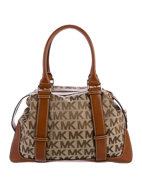 tan purse michael kors|Michael Kors hand luggage.